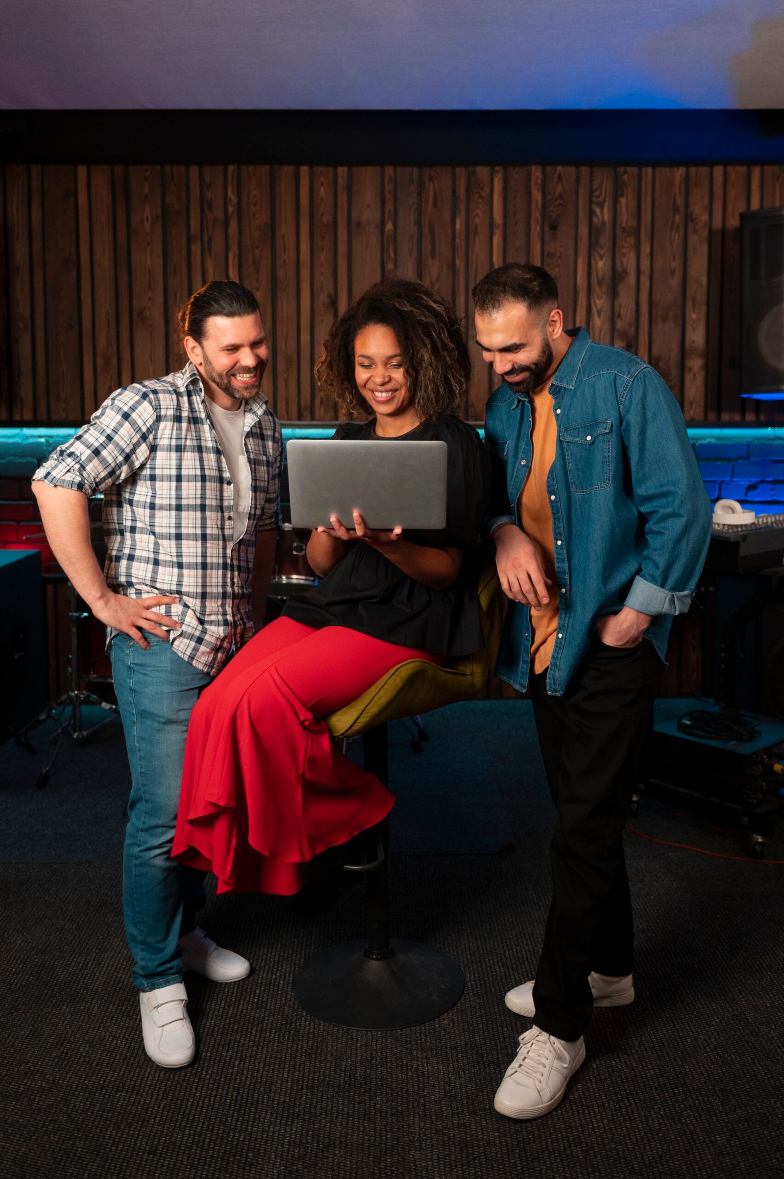 front-view-musicians-working-with-laptop